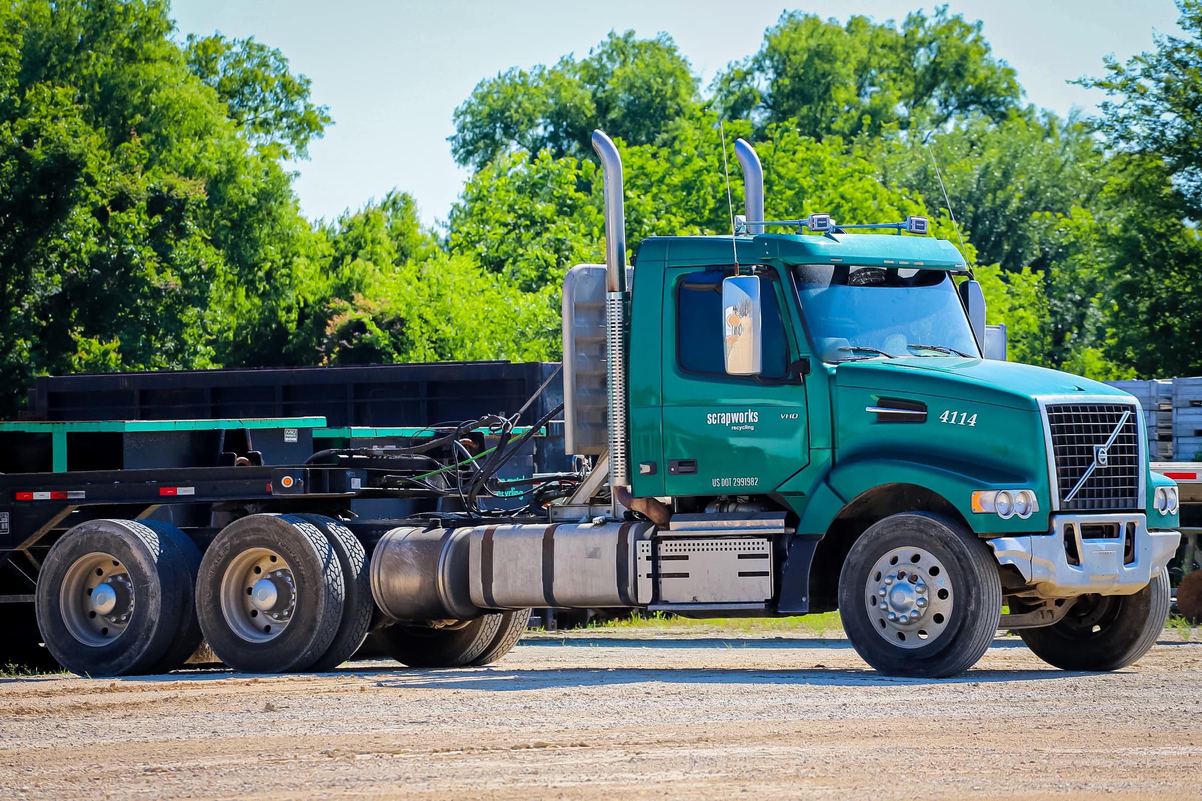 Heavy transport truck at Scrapworks logistics facility